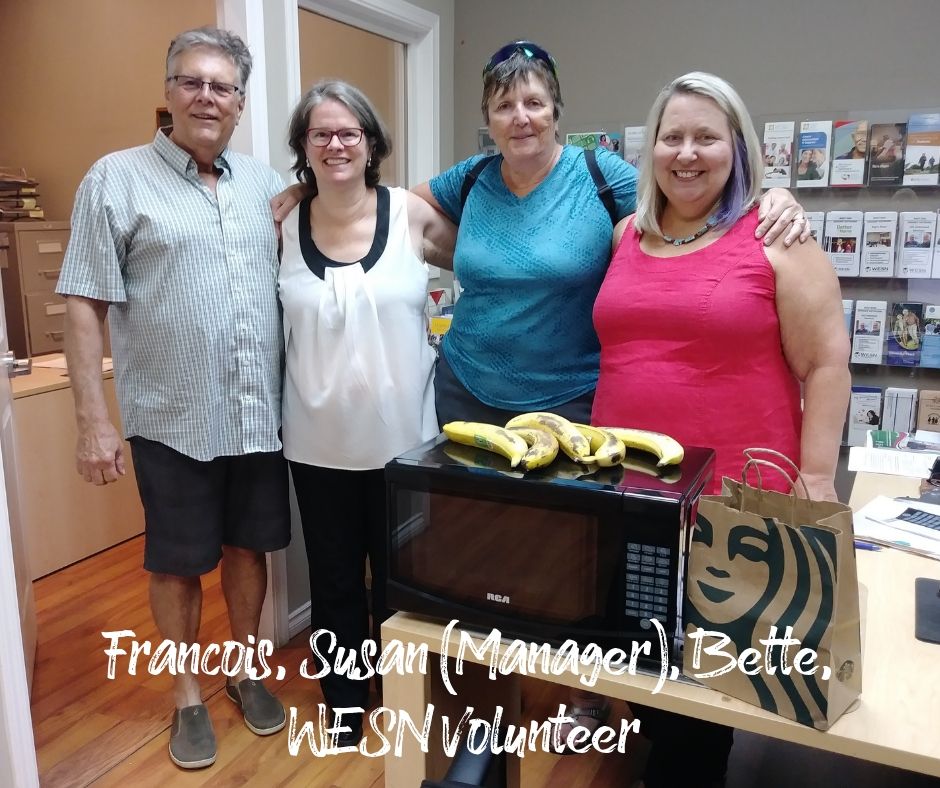 WESN Centre - Francois Daoust, Susan (Manager), Bette Daoust, and volunteer with new microwave oven and Starbucks donations!