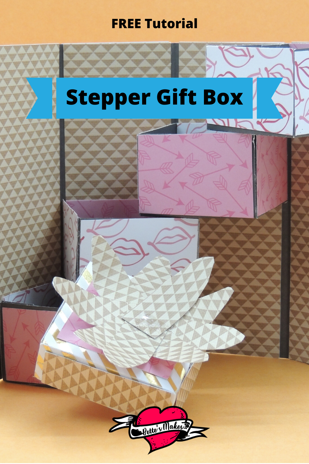 The absolutely PERFECT box for giving! You can sneak in 4 treats all in one present. Just imagine the oohs and ahhs when you make this gorgeous stepper gift box using your Cricut. #cricut #cricutcraft #paperbox #giftbox #papercraft